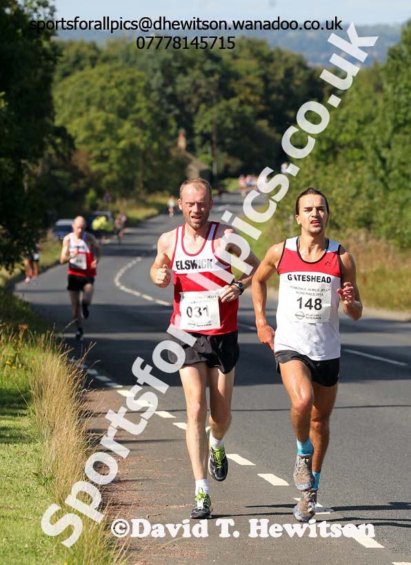 Conrad Franks (Gateshead) and Lee Bennett (Elswick, who lives in Wylam) lead the Tynedale 10 Mile Jelly Road Race at about half way. Photo: David T. Hewitson/Sports for All Pics
